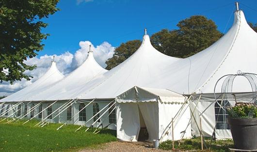 a line of sleek and modern portable restrooms ready for use at an upscale corporate event in Swampscott, MA